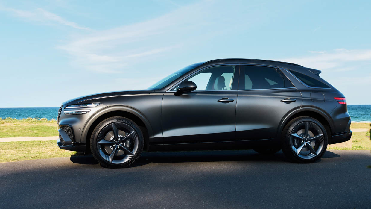 2025 Genesis GV70 Signature Sport side angle beach shot