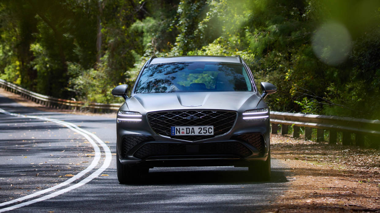 2025 Genesis GV70 Signature Sport front angle driving shot