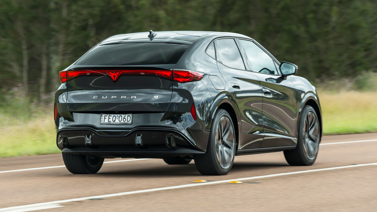 Cupra Tavascan 2025 driving rear 2