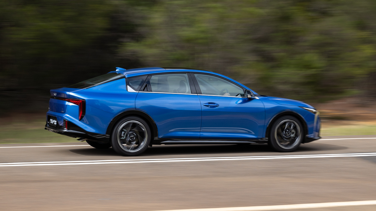 Kia K4 GT-Line 2025 driving rear 3