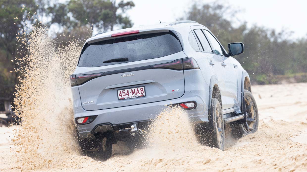 Isuzu MU-X 2025 X-Terrain driving beach 4