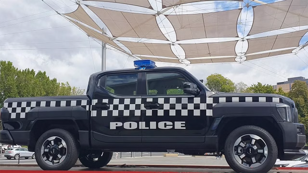 2025 Kia Tasman Police Livery side view