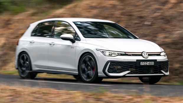 2025 Volkswagen Golf GTI white front 3 4 roller