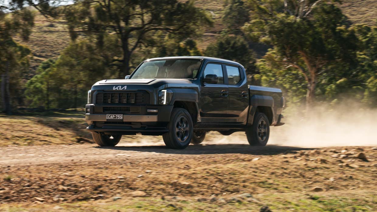 Kia Tasman SX 2025 driving front 2