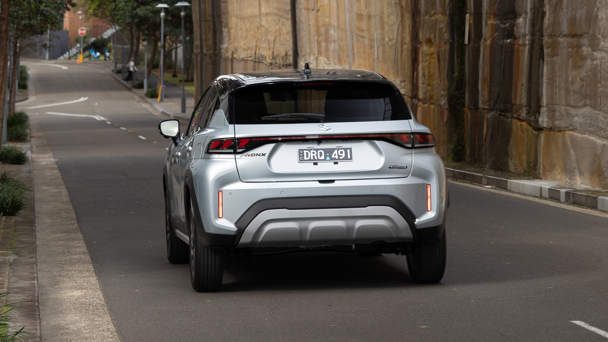 Suzuki Fronx hybrid 2025 driving rear