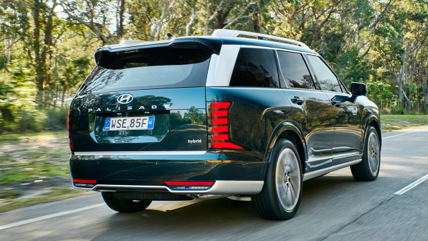 2026 Hyundai Palisade driving rear 3 4