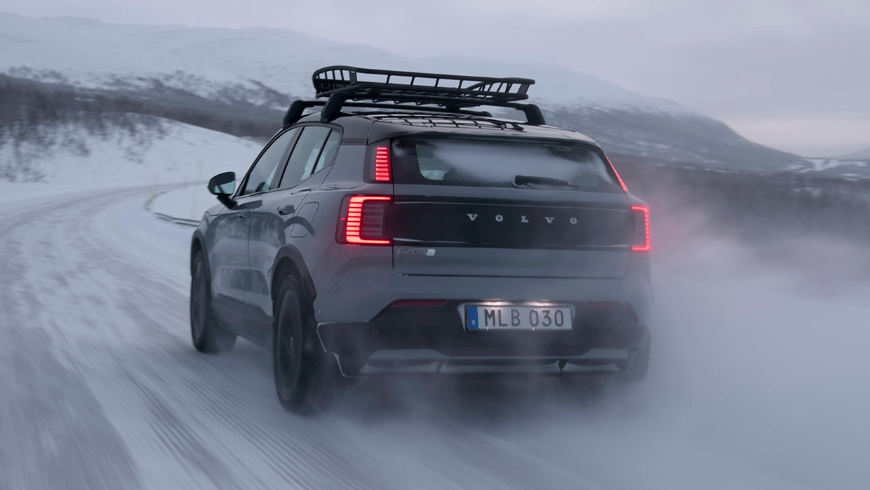 2026 Volvo EX30CC driving rear 3 4